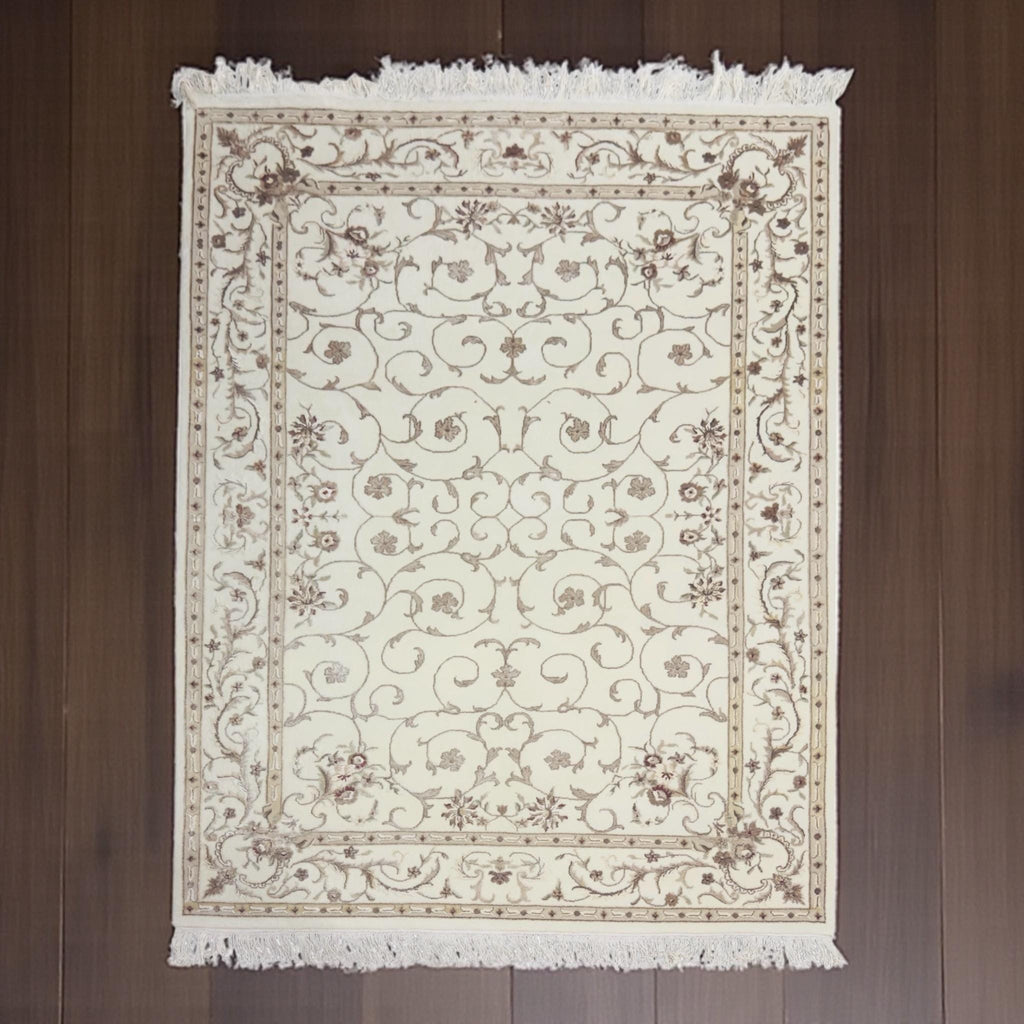 Handwoven Ivory Wool Rug: Persian Floral Art Silk Design